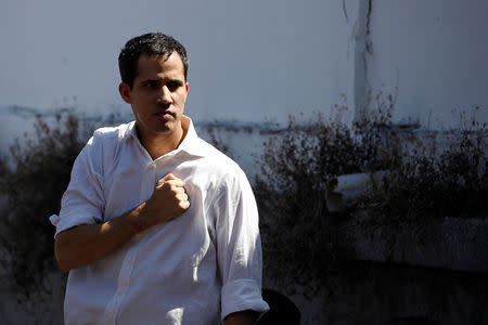 Juan Guaido, President of the Venezuelan National Assembly and lawmaker of the opposition party Popular Will (Voluntad Popular), gestures while he arrives to a gathering in La Guaira, Venezuela January 13, 2019. REUTERS/Carlos Garcia Rawlins