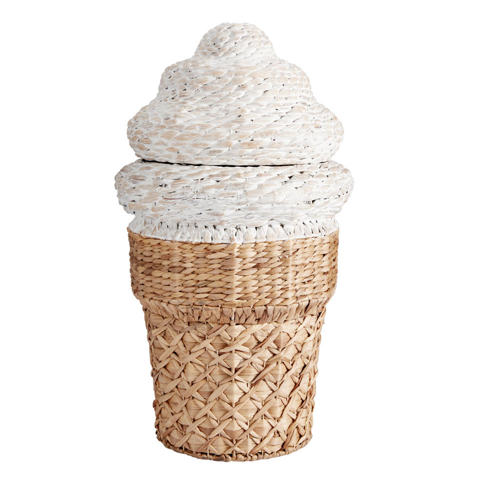 This undated photo shows Pottery Barn Teen's Ice Cream Cone Hamper. Pottery Barn Teen makes tidying up a pleasant job with this 30" tall water hyacinth storage hamper shaped like an ice cream cone. Ice cream is one of summer's pleasures. So why not lift moods and have a little decor fun this season by bringing some ice-creamy colors into your living space? Interior design experts say you can get that summery vibe with a few accessories or a can of paint or roll of wallpaper. (Pottery Barn Teen via AP)