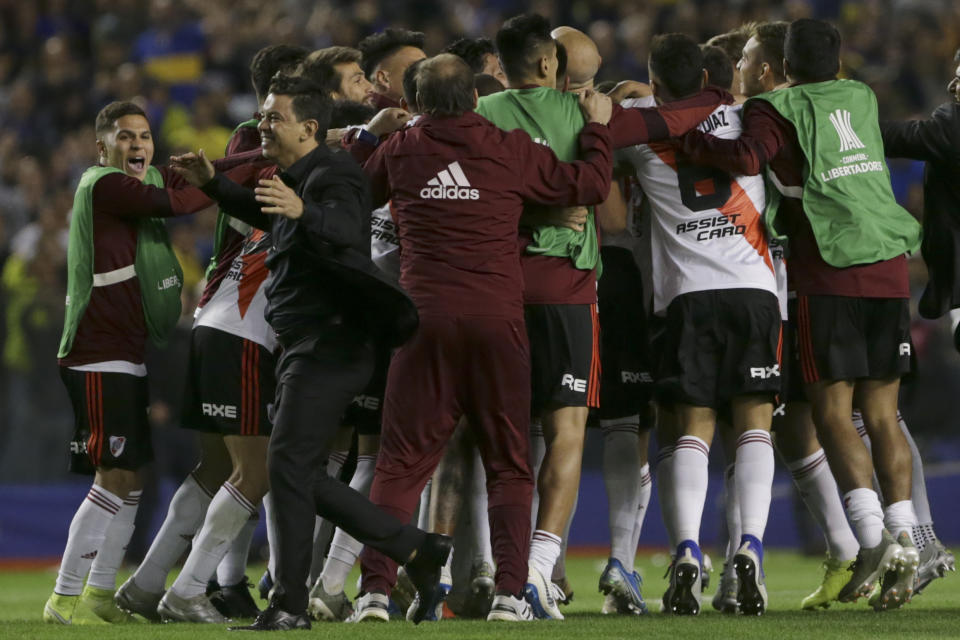 Marcelo Gallardo coach of River Plate celebrates at the end of a Copa Libertadores semifinal second leg soccer match against Boca Juniors at La Bombonera stadium in Buenos Aires, Argentina, Tuesday, Oct. 22, 2019. River lost the match 0-1 but won 2-1 on aggregate and qualified to the final. (AP Photo/Daniel Jayo)