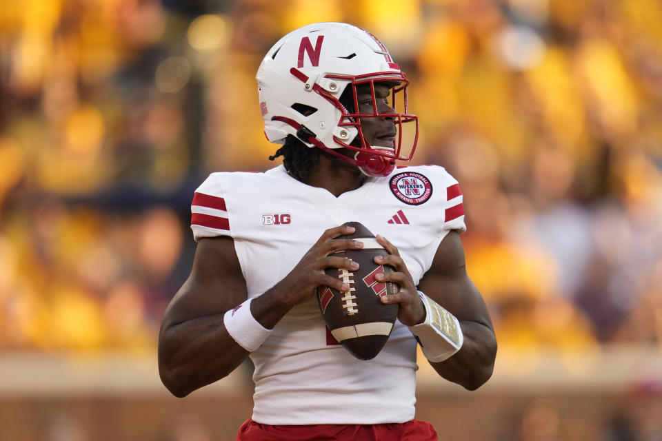 Nebraska quarterback Jeff Sims looks for a receiver during the first half of the team's NCAA college football game against Minnesota, Thursday, Aug. 31, 2023, in Minneapolis. (AP Photo/Abbie Parr)