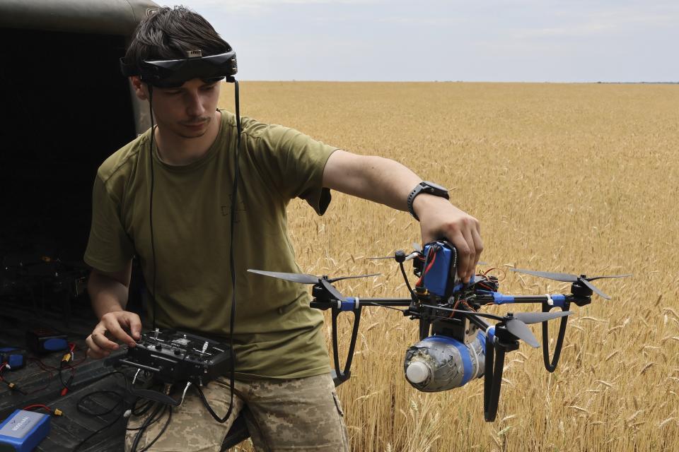 FILE - A Ukrainian serviceman operates a drone on the front line in the Zaporizhzhia region of Ukraine, on Friday, June 14, 2024. Russia has taken advantage of its edge in firepower amid delays in U.S. aid to scale up attacks in several areas along the 1,000-kilometer (600-mile) front. (AP Photo/Andriy Andriyenko, File)