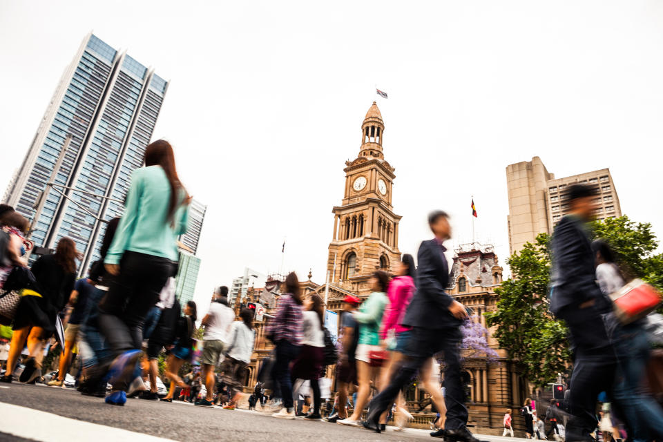 Crosswalk, people crossing in downtown