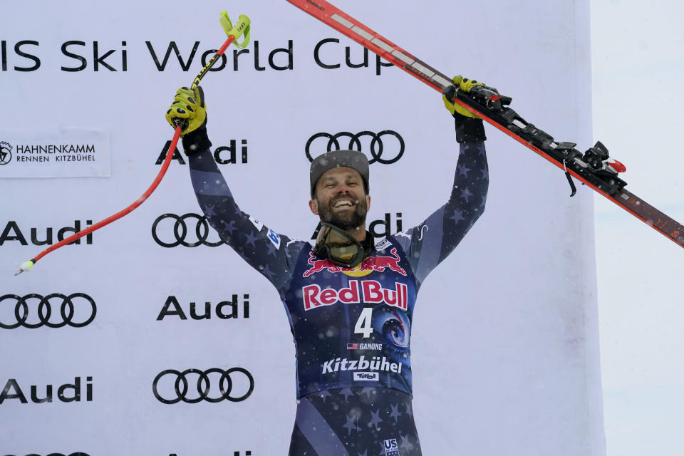 FILE - Third place United States' Travis Ganong celebrates on the podium after an alpine ski, men's World Cup downhill race in Kitzbuehel, Austria, Saturday, Jan. 21, 2023. Ganong announced Thursday, March 2, 2023, his journey on ski racing’s World Cup carousel ends after the season. (AP Photo/Giovanni Auletta, File)