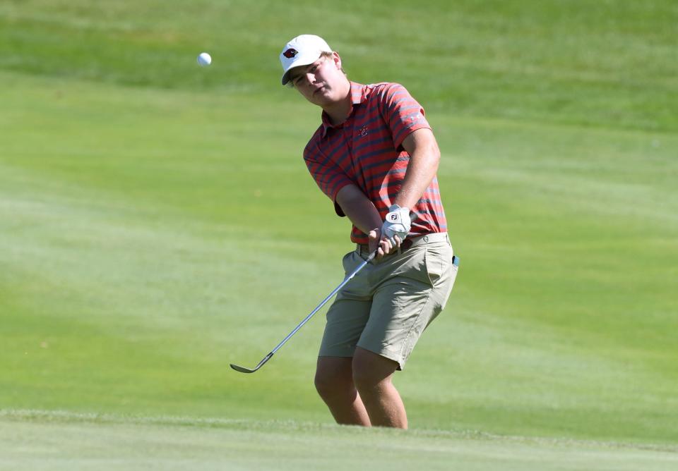 St. Charles junior Leo Walling chips onto the green during a CCL tournament last season. Walling qualified for the Division I state tournament as a freshman, tying for 34th of 72 competitors with a two-day 159.