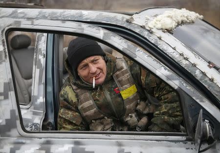 A member of the Ukrainian armed forces is seen near Debaltseve, eastern Ukraine, February 20, 2015. REUTERS/Gleb Garanich
