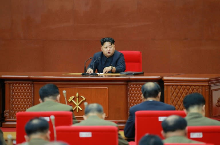 North Korean leader Kim Jong-Un (C) attends an enlarged meeting of the Central Military Commission of the Workers' Party of Korea (WPK), at an undisclosed location, on August 28, 2015