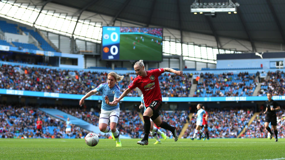 Manchester City Women's Aoife Mannion (left) and Manchester United's Leah Galton battle for the ball during the FA Women's Super League match at the Etihad Stadium, Manchester. (Photo by Nigel French/PA Images via Getty Images)