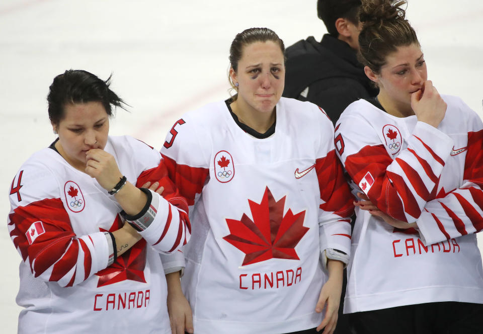 <p>Brigette Lacquette, Lauriane Rougeau and Rebecca Johnston wait their medals as Canada loses in a shootout to the United States in the Olympic women’s hockey gold medal game at the Gangneung Hockey Centre in Gangneung in Pyeongchang in South Korea. February 22, 2018. (Steve Russell/Toronto Star via Getty Images) </p>