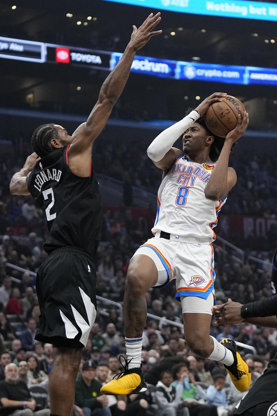Oklahoma City Thunder forward Jalen Williams, right, shoots as LA Clippers forward Kawhi Leonard defends during the first half of an NBA basketball game Thursday, March 23, 2023, in Los Angeles. (AP Photo/Mark J. Terrill)