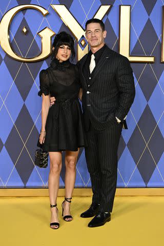 <p>Kate Green/Getty</p> John Cena and wife Shay Shariatzadeh at "Argylle" premiere