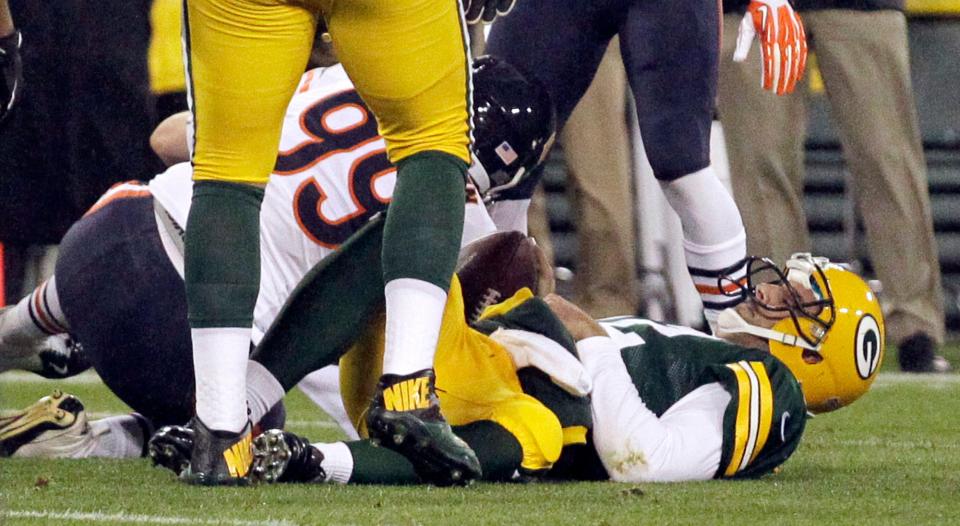 Green Bay Packers quarterback Aaron Rodgers (12) is injured on this play during the first quarter of their game against the Chicago Bears on Nov. 4.