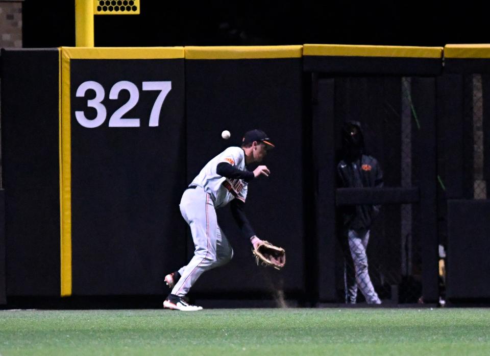 Oklahoma State's outfielder Nolan Schubart (10) misses Texas Tech's Gavin Kash’s hit during game one of the Big 12 home opener, Friday, March 17, 2023, at Rip Griffin Park. 