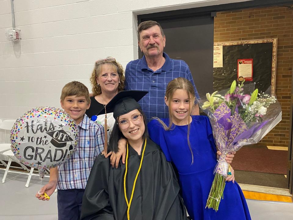 Christina Andreasson of Mansfield graduated NCSC Friday night with an associate's degree in cyber security. Son Gavin Fulk, 7, her parents Carol and John, and daughter Thalia Fulk, 9,  said how proud they are of Christina.