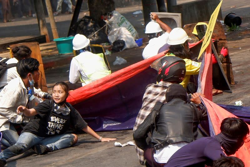 Angel takes cover before being shot in the head in Mandalay