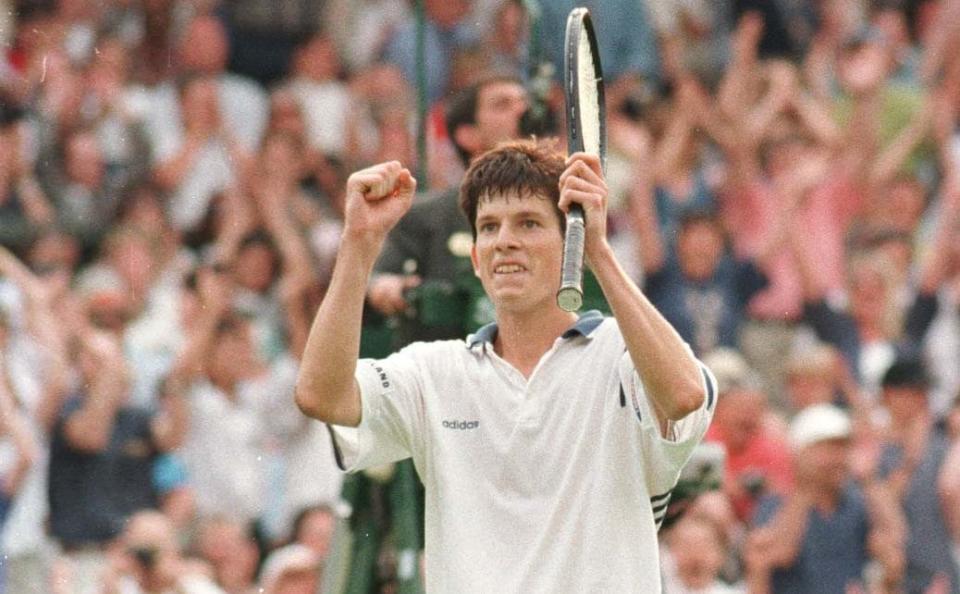 Tim Henman celebrates his win over Yevgeny Kafelnikov in 1996 - Tim Henman exclusive: 'We must be patient with Emma Raducanu – she will be around for a long time' - RUSSELL CHEYNE