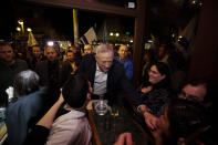 Blue and White party leader Benny Gantz visits downtown Tel Aviv, Israel, as a part of his election campaign, Thursday, Feb. 13, 2020. (AP Photo/Sebastian Scheiner)