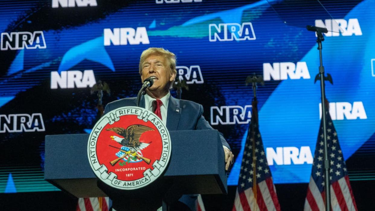 <div>HARRISBURG, PENNSYLVANIA - FEBRUARY 09: Republican U.S. presidential candidate and former President Donald Trump speaks at the National Rifle Association presidential forum at the Great American Outdoor Show on February 09, 2024 in Harrisburg, Pennsylvania. Trump used the opportunity to emphasize his support of gun rights as the campaign moves to South Carolina and its February 24 GOP primary. (Photo by Spencer Platt/Getty Images)</div>