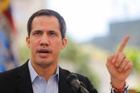 Venezuelan opposition leader Juan Guaido speaks during a news conference in Caracas