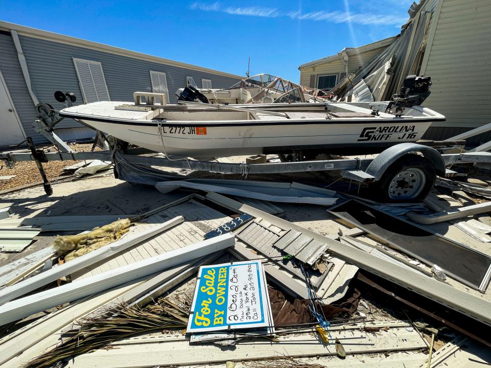 A 'for sale' sign rest in rubble. Agusto "Kiko" and Julia "Gordie" Villalon, long time Pine Island residents, returned to their Island home for the first time since evacuating before Hurricane Ian. Monday, September 03, 2022, they got to find out just how much damage there was.