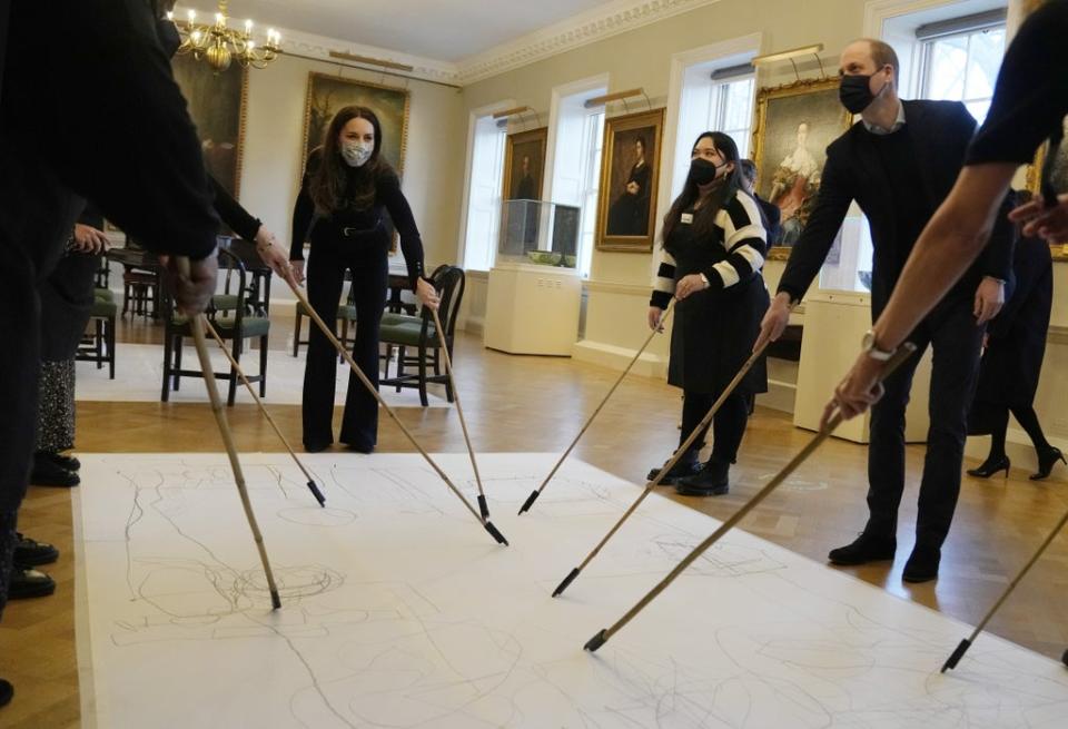 The Cambridges participated in a therapy session with individuals who had experienced the care system (Alastair Grant/PA) (PA Wire)