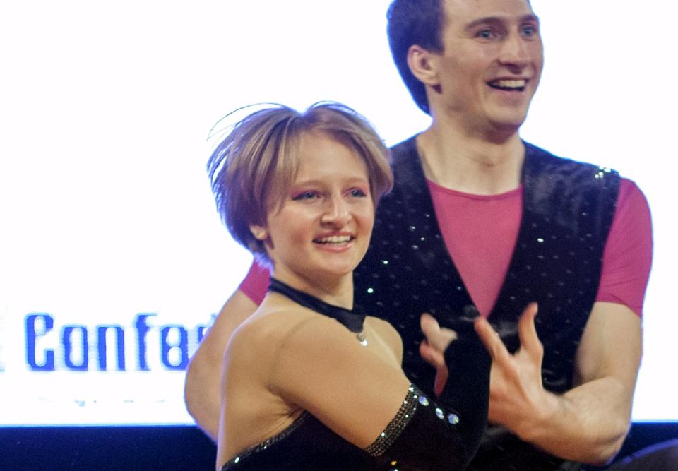 Katerina Tikhonova (L), daughter of Russian President Vladimir Putin, dances with Ivan Klimov during the World Cup Rock'n'Roll Acrobatic Competition in Krakow, Poland April 12, 2014. Picture taken April 12, 2014. To match Special Report RUSSIA-CAPITALISM/DAUGHTERS REUTERS/Jakub Dabrowski EDITORIAL USE ONLY. NO RESALES. NO ARCHIVE