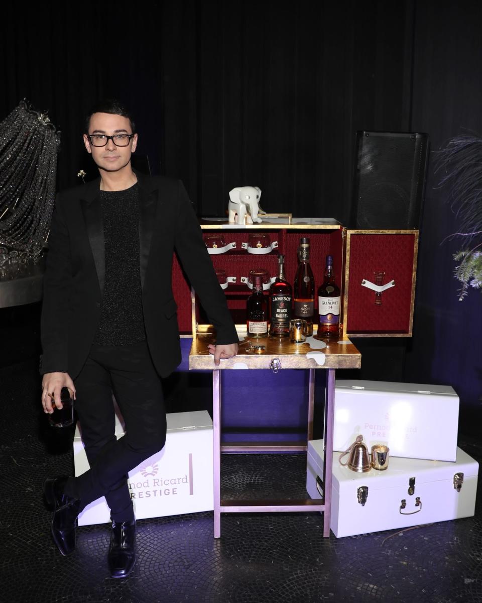 Christian Siriano at the Elegant White Elephant Exchange in New York City on December 13.