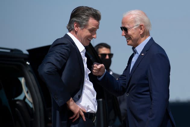 California Gov. Gavin Newsom (D) greets President Joe Biden on Monday. As part of an effort to drive up Democratic turnout, Biden was scheduled to hold a rally for Newsom in Long Beach. (Photo: BRENDAN SMIALOWSKI/Getty Images)