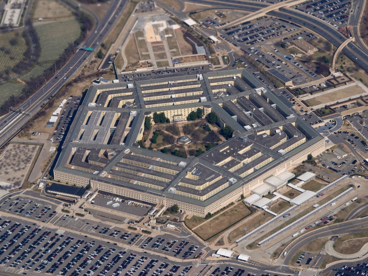 The Pentagon is seen from Air Force One as it flies over Washington, March 2, 2022. A new Pentagon office set up to track reports of unidentified flying objects has received 'several hundreds' of new reports, but no evidence so far of alien life. That's according to the leadership of the All-domain Anomaly Resolution Office. (Patrick Semansky/AP - image credit)