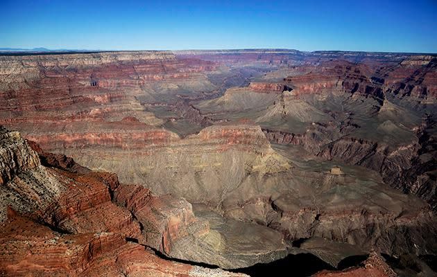 The Grand Canyon National Park is covered in the morning sunlight as seen from a helicopter near Tusayan. Source: Getty