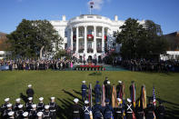 President Joe Biden speaks as he welcomes French President Emmanuel Macron during a State Arrival Ceremony on the South Lawn of the White House in Washington, Thursday, Dec. 1, 2022. (AP Photo/Patrick Semansky)