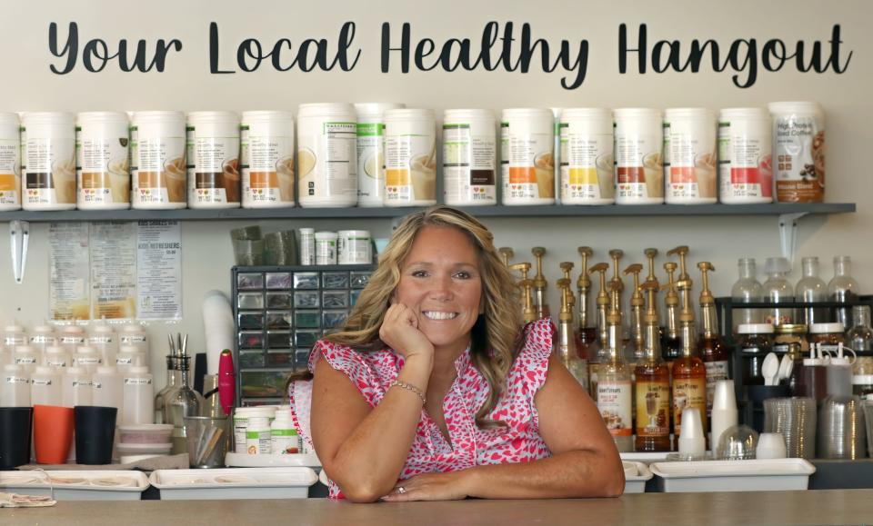 Owner Jennifer Carroll stands behind the counter at FIT N LIT Nutrition Tuesday morning, Aug. 1, 202, on East Dallas Road in Stanley.