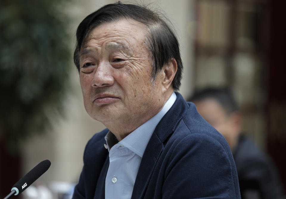 In this Tuesday, Jan. 15, 2019, photo, Ren Zhengfei, founder and CEO of Huawei, listens to reporters questions during a round table meeting with the media in Shenzhen city, south China's Guangdong province. China's government called on Washington on Tuesday to "stop the unreasonable crackdown" on Huawei following the tech giant's indictment in the U.S. on charges of stealing technology and violating sanctions on Iran. (AP Photo/Vincent Yu)