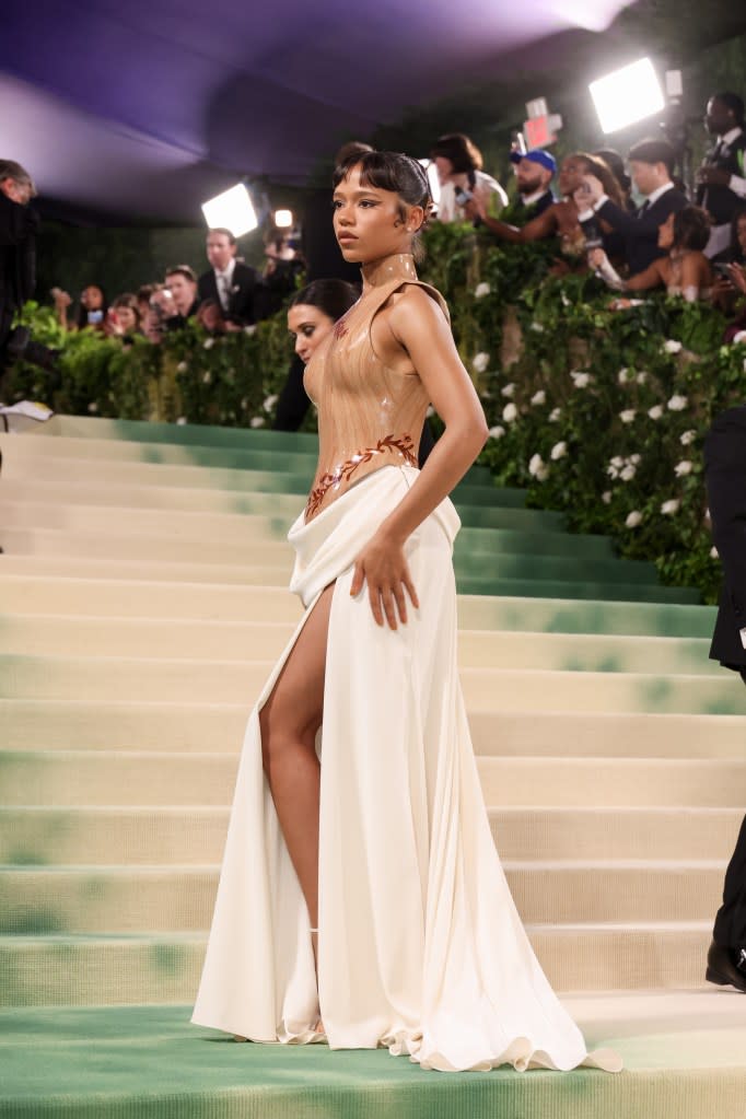 Taylor Russell wore a custom-molded bodice made to look like wood at the 2024 Met Gala. WireImage