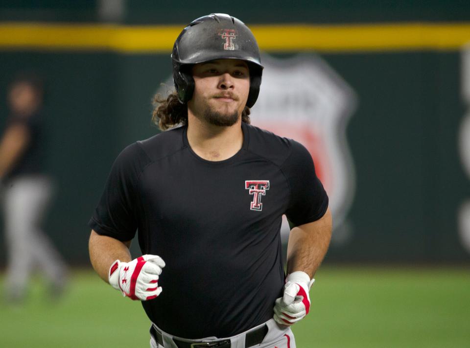 Texas Tech designated hitter Ty Coleman goes through practice Tuesday at Globe Life Field in Arlington. The Texas Rangers' third-year stadium is the site of the Big 12 tournament that begins Wednesday and concludes with the championship game Sunday.