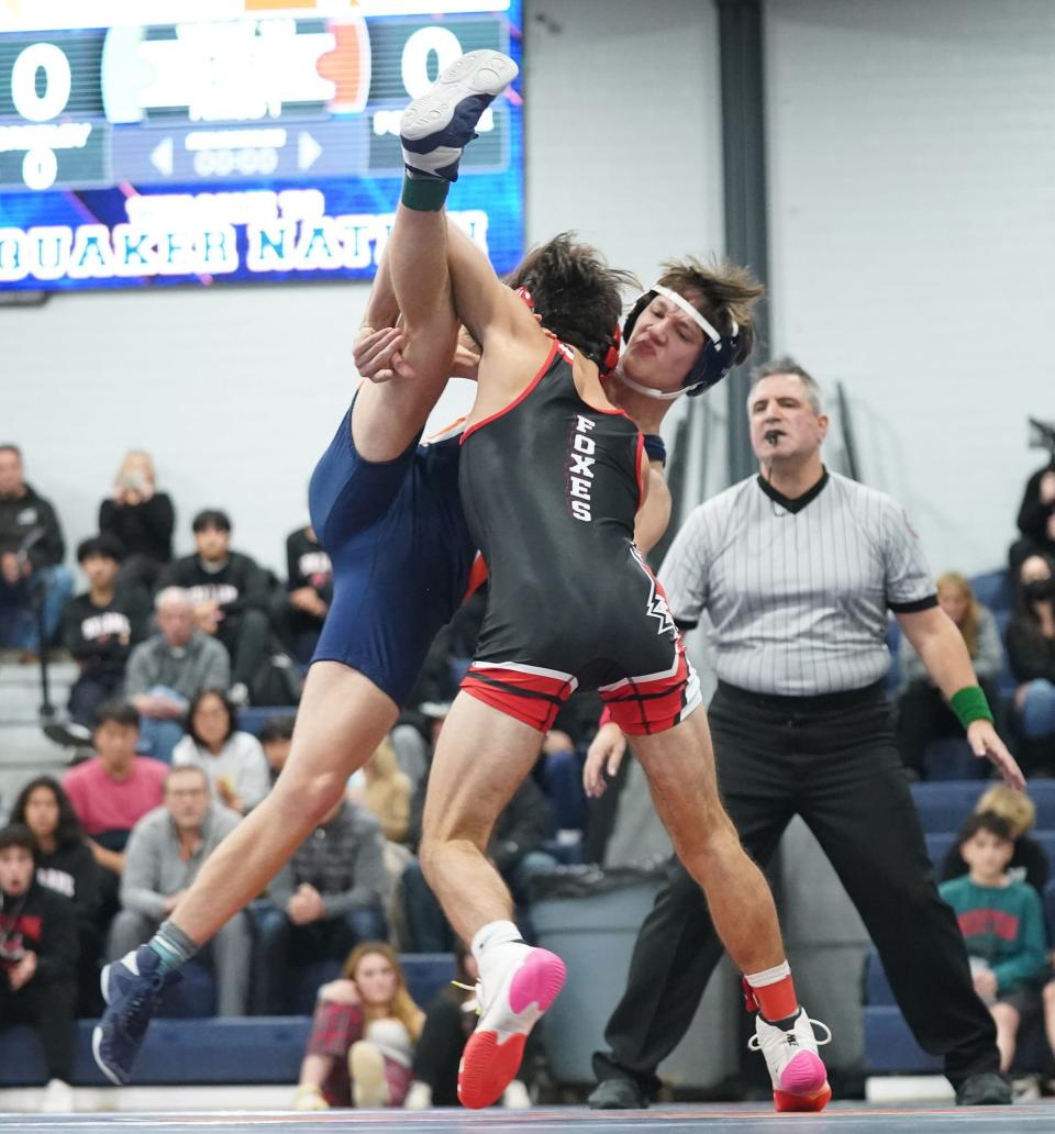 Fox Lane's Justin Gierum wrestles Horace Greeley's Otto Mindenhall in the 138-pound match in the quarter finals of the Section 1 Dual Meet Tournament at Horace Greeley High School in Chappaqua on Wednesday, December 14, 2022.