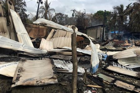 A burnt house is seen in a village in Maungdaw in the north of Rakhine state in Myanmar, September 12, 2017. REUTERS/Stringer/Files