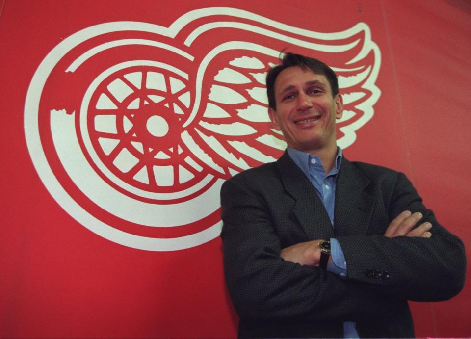 Ken Holland, General Manager of the Detroit Red Wings, stands aside their team logo at Joe Louis Arena, Thursday, Oct. 16, 1997.