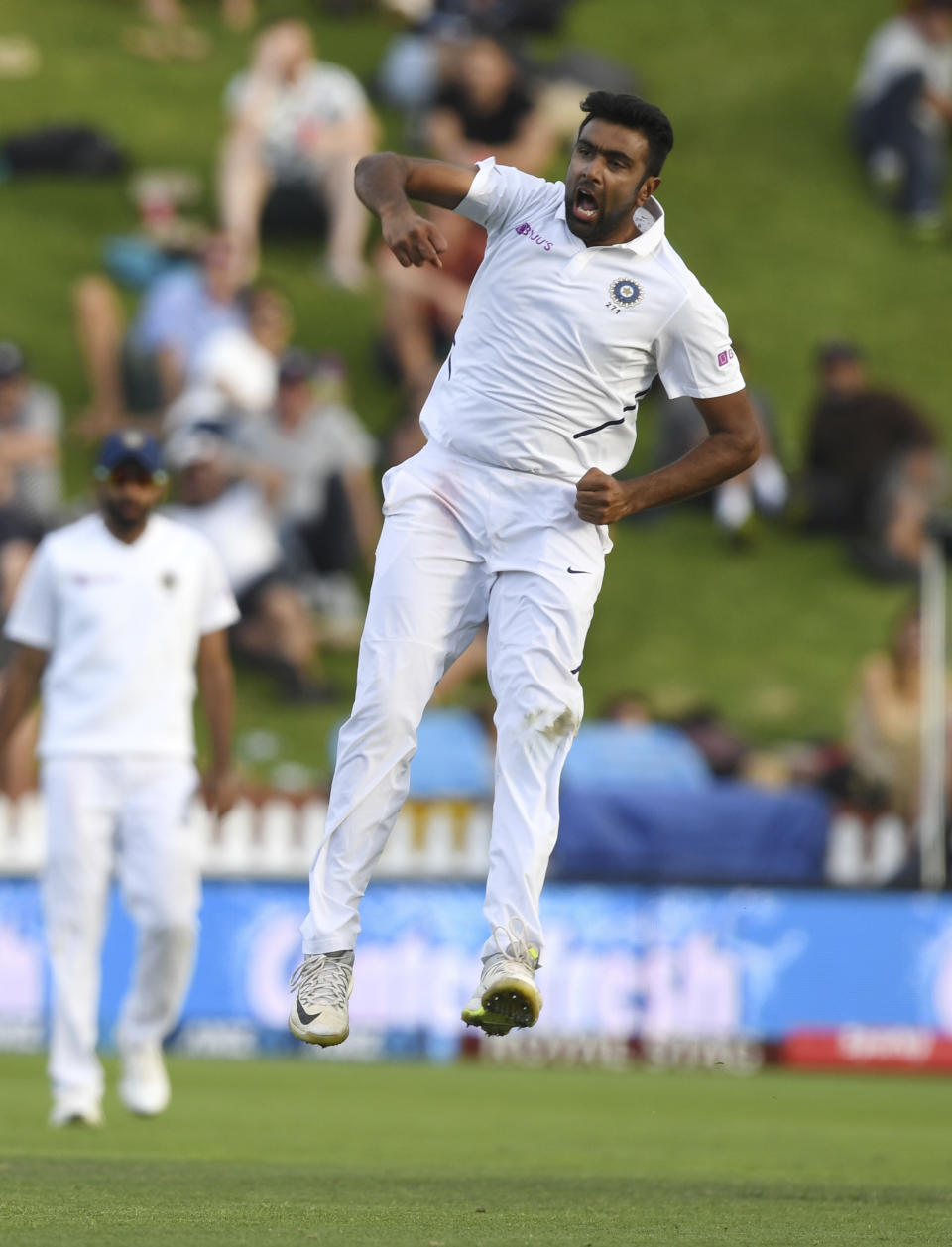 India's Ravichandran Ashwin celebrates dimissing New Zealand's Henry Nicholls for 17 during the first cricket test between India and New Zealand at the Basin Reserve in Wellington, New Zealand, Saturday, Feb. 22, 2020. (AP Photo/Ross Setford)