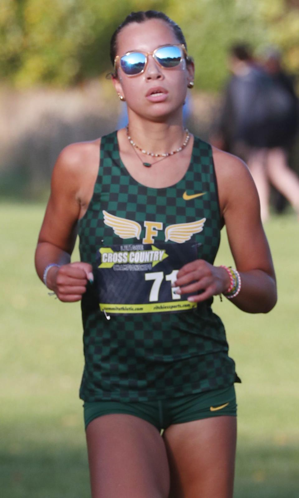 Firestone's Reese Brady finishes second in the City Series cross country championship at Goodyear Heights Metro Park, Wednesday, Oct. 11, 2023.