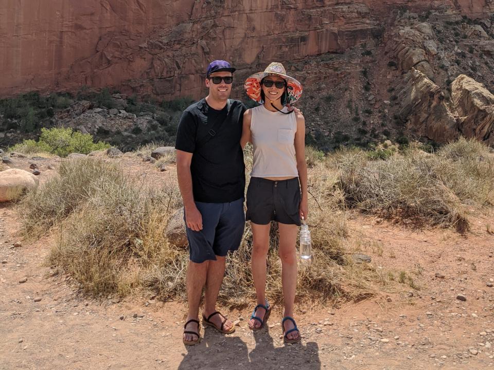 Ian Hughes and Jai-Yu Fu pose for a a photo while on a hike in Utah.