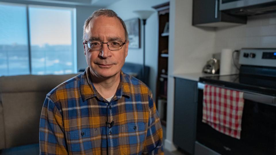 Guy Faubert lives in an apartment in Gatineau, Que., heated by waste heat from the nearby Kruger Products paper plant. He says the comfort is 'exceptional' and says the environmentally friendly heating system was one reason he chose to live here.