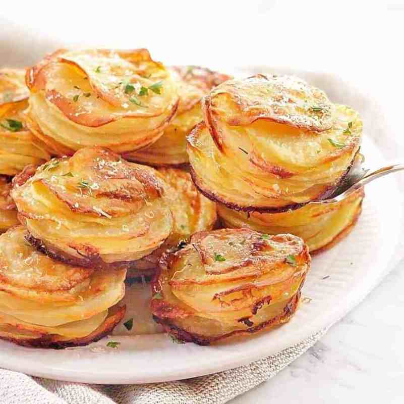 <p>Chef Not Required</p><p>These creamy little beauties are like mini individual serves of au gratin potatoes, made in a muffin tin!</p><p><strong>Get the recipe: <a href="https://www.chefnotrequired.com/mini-potato-stacks/" rel="nofollow noopener" target="_blank" data-ylk="slk:Muffin Tin Red Potato Stacks;elm:context_link;itc:0;sec:content-canvas" class="link rapid-noclick-resp">Muffin Tin Red Potato Stacks</a></strong></p>