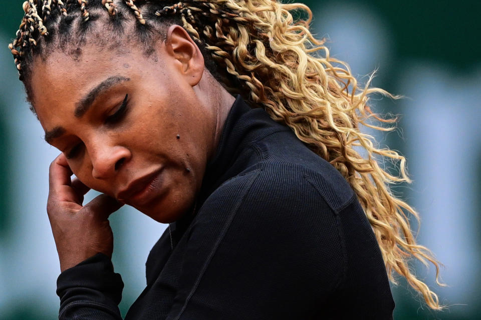 Serena Williams reacts as she plays against Kristie Ahn during their women's singles first round tennis match at Roland Garros 2020.