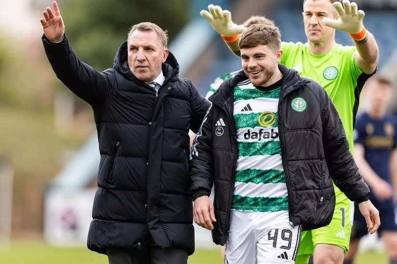 Celtic manager Brendan Rodgers with James Forrest at full time -Credit:SNS Group