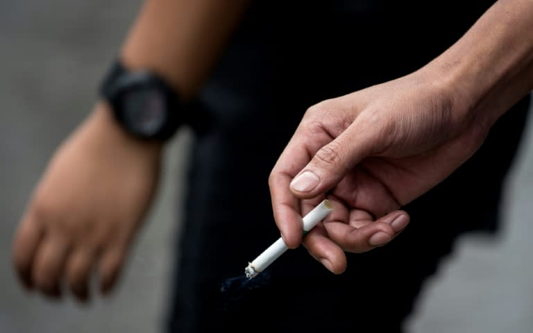 Smoking consumed the equivalent of nearly two percent of global economic output or GDP, according to experts from the World Health Organization and the American Cancer Society