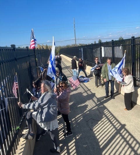 A rally in support of Israel and the hostages held by Hamas was held Thursday, April 25, 2024, on an overpass above Interstate 696 in Farmington Hills. Organized by Jewish advocates, the group held two banners that read "Free The Hostages Now" and "Let My People Go," a phrase tied to the Passover holiday.