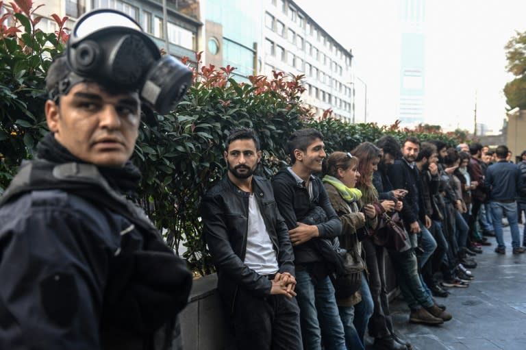 Turkish riot police detain protesters during a demonstration in Istanbul, on November 5, 2016