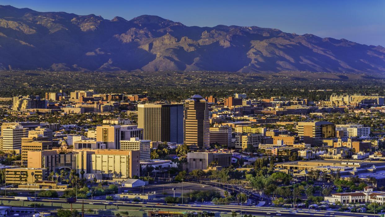 Tucson Arizona skyline and Santa Catalina Mountains at dusk.