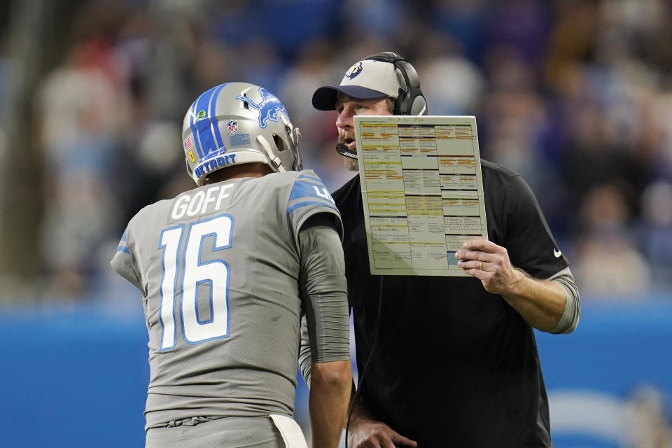 Detroit Lions head coach Dan Campbell gives quarterback Jared Goff the last play of the game during the second half of an NFL football game against the Minnesota Vikings, Sunday, Dec. 5, 2021, in Detroit. (AP Photo/Paul Sancya)