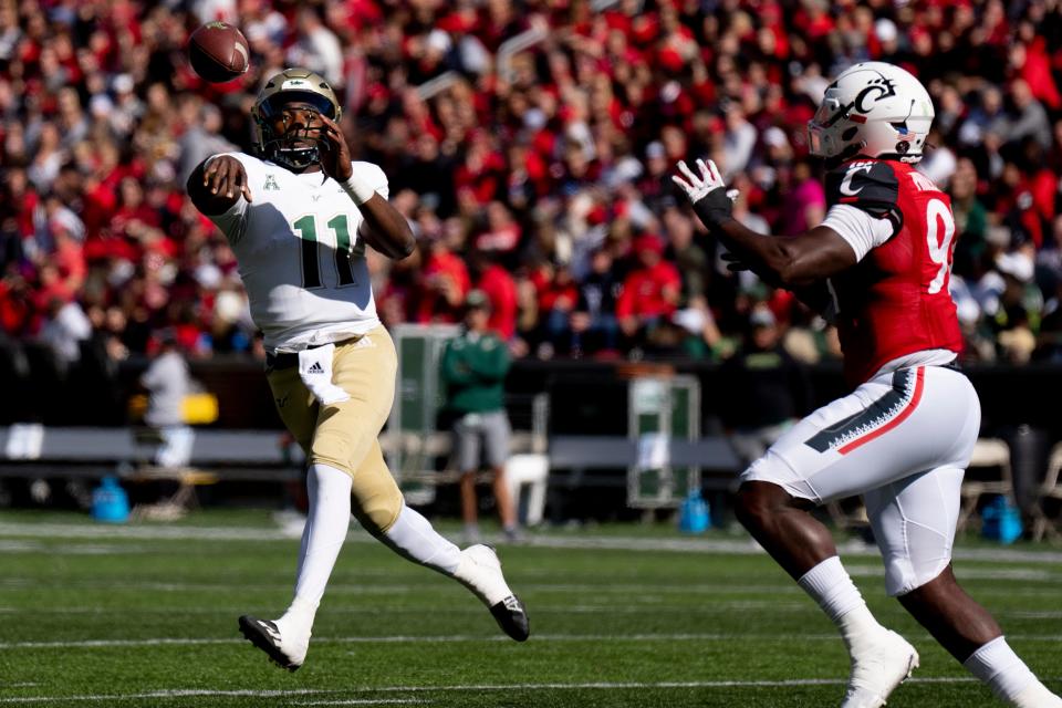 South Florida Bulls quarterback Gerry Bohanon (11) throws a pass in the first quarter of the NCAA Football game between the Cincinnati Bearcats and the South Florida Bulls at Nippert Stadium in Cincinnati on Saturday, Oct. 8, 2022. 